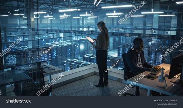 stock-photo-female-information-technology-engineer-reviews-security-logs-on-her-tablet-computer-in-a-high-tech-2682443645.jpg